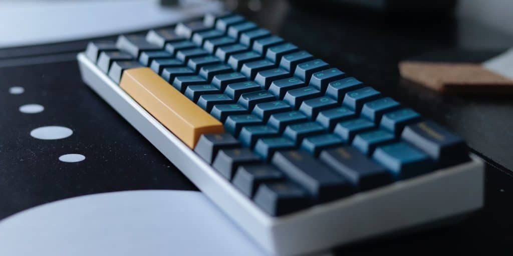 Mechanical keyboard sitting on a desk.