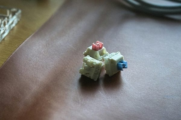 Mechanical keyboard switches on a desk mat.